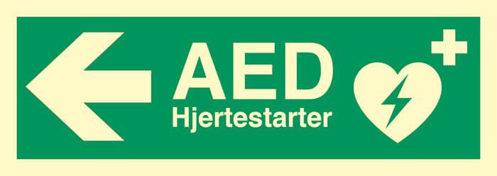 Henv. skilt, AED hjertestarter/venstre
